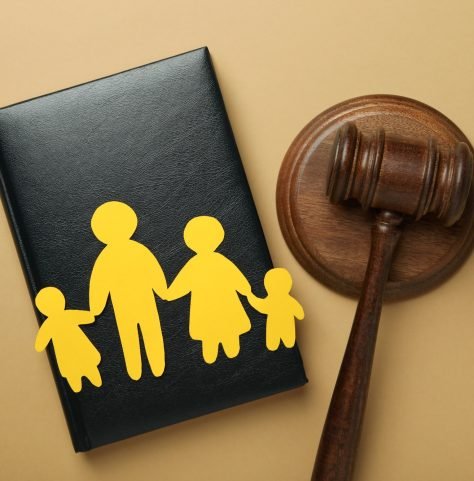 Family law concept on light brown background Family law concept on light brown background